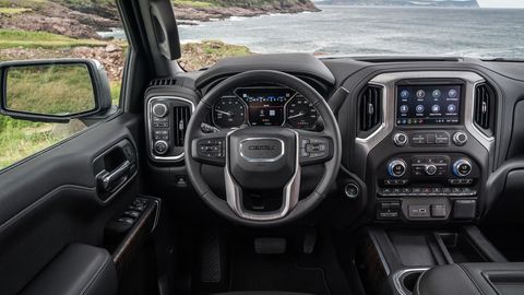 The 2019 GMC Sierra Denali gets an interior upgrade including premium leather seats, open-pore ash wood trim and dark-finish aluminum.