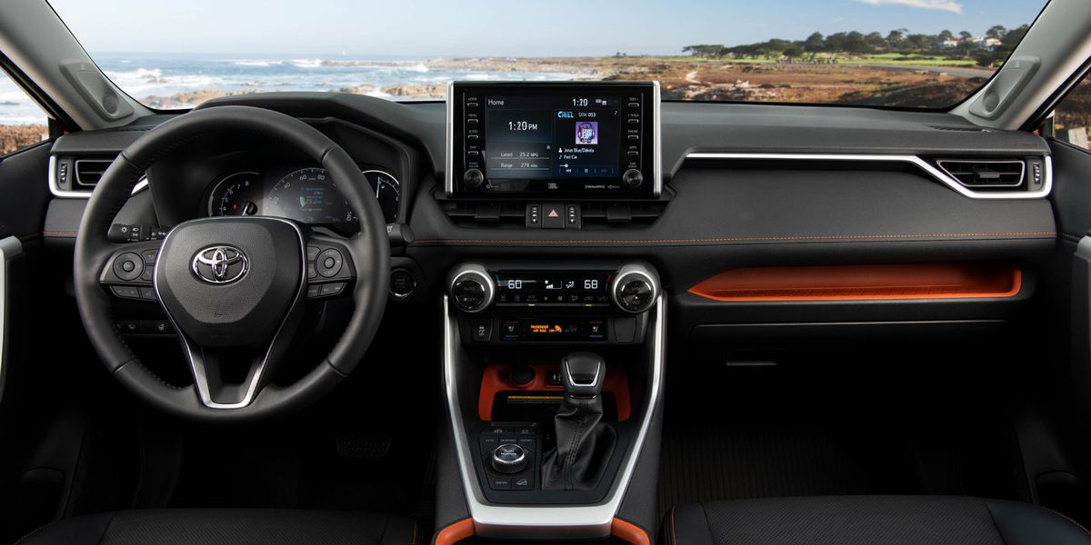 The 2019 Toyota RAV4 Adventure features orange accents inside, along with rubber trim on knobs and switches.