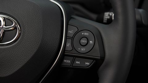 The 2019 Toyota Rav4 Adventure features orange accents inside along with rubber trim on knobs and switches.