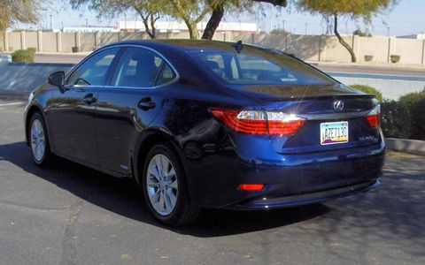 The 2013 Lexus ES300h is powered by a 2.5-liter Atkinson-cycle four-cylinder engine paired with two electric motors for a total output of 200 hp.