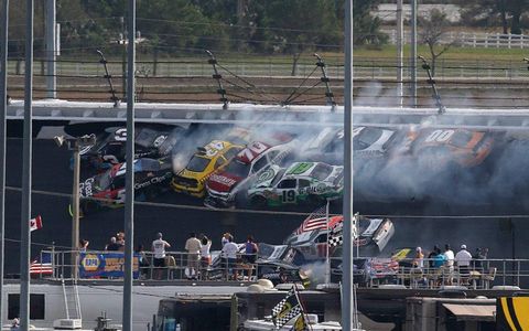 The pileup begins coming down the main straightaway on the last lap of the Nationwide race at Daytona.