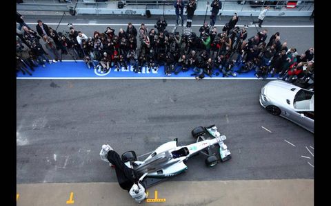 ALL EYES// Every camera was focused on Michael Schumacher and Nico Rosberg as they unveiled the Mercedes GP W03 in Barcelona.