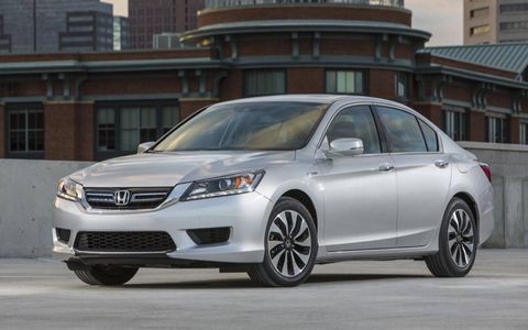 The CVT transmission in the 2014 Honda Accord Hybrid Touring  works seamlessly with minimal lag.