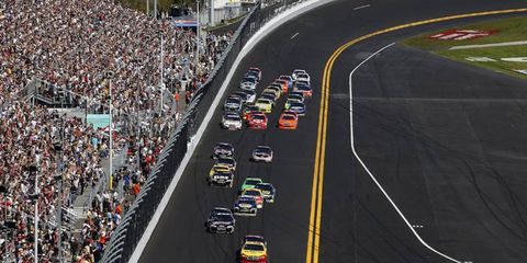 Kurt Busch leads the field during the first lap.