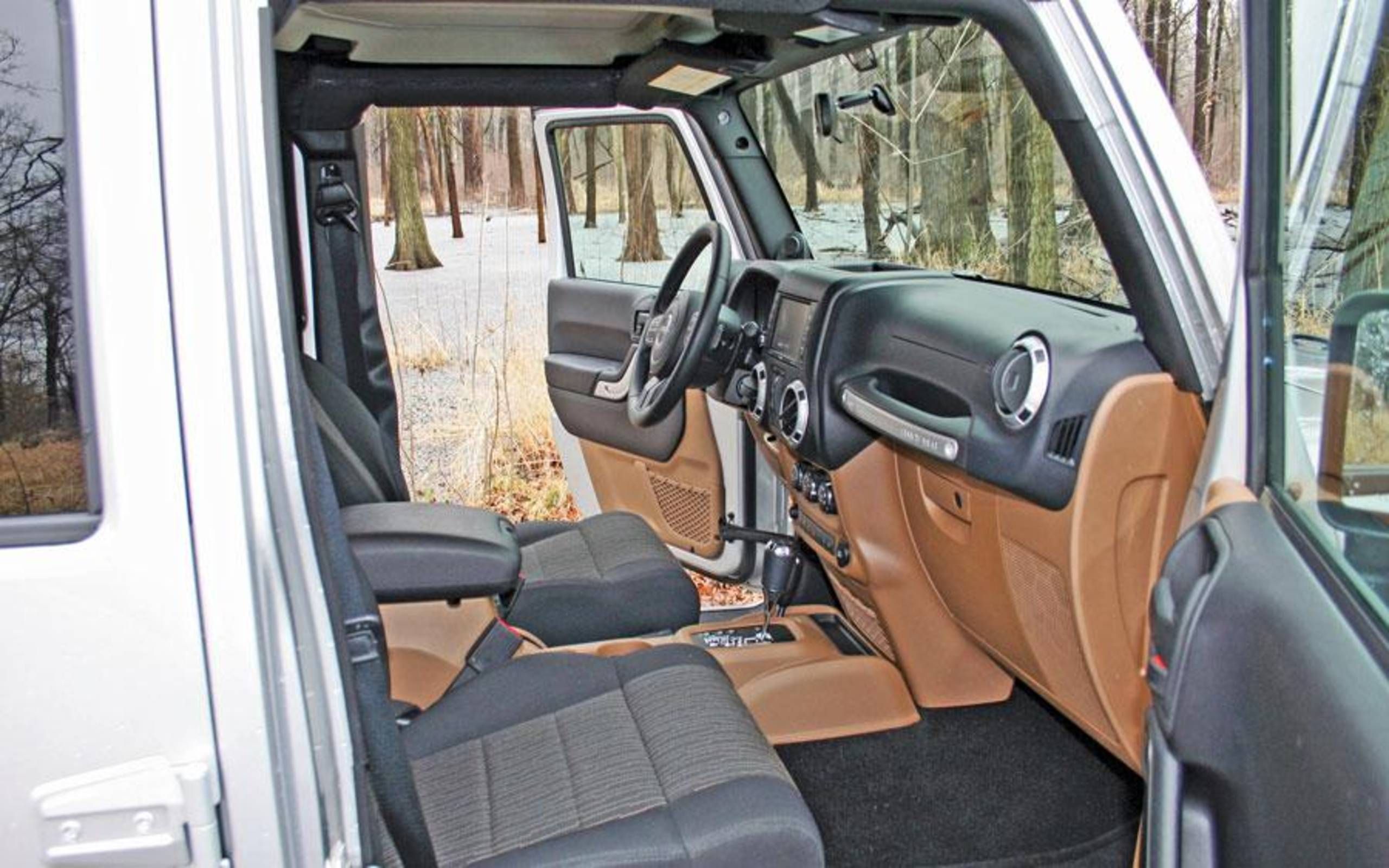 2012 Jeep Wrangler Unlimited Sahara: Review notes: Plush (for a Wrangler)  and powerful with Pentastar V6