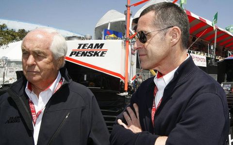 Many insiders feel Greg Penske, right, is being groomed to take over  Roger Penske's racing and business empire one day.