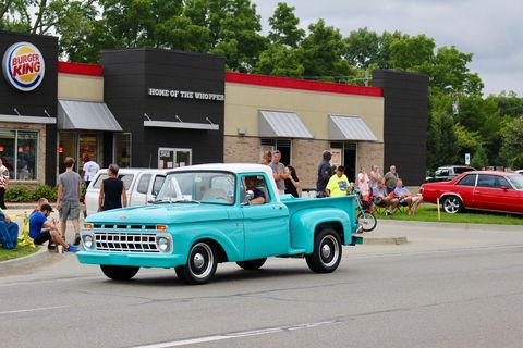 This early 1960s Ford F100 has a hot rod look with its lowered nose.