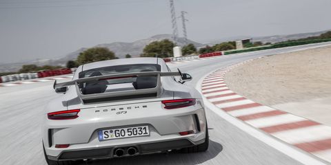 The carbon rear wing -- a characteristic, iconic feature of Porsche GT sports cars -- is situated about 1 inch higher in the air flow than on the predecessor model, generating greater downforce.
