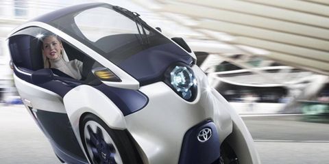 Toyota unveiled the three-wheeled, all-electric i-ROAD concept at the Geneva motor show.