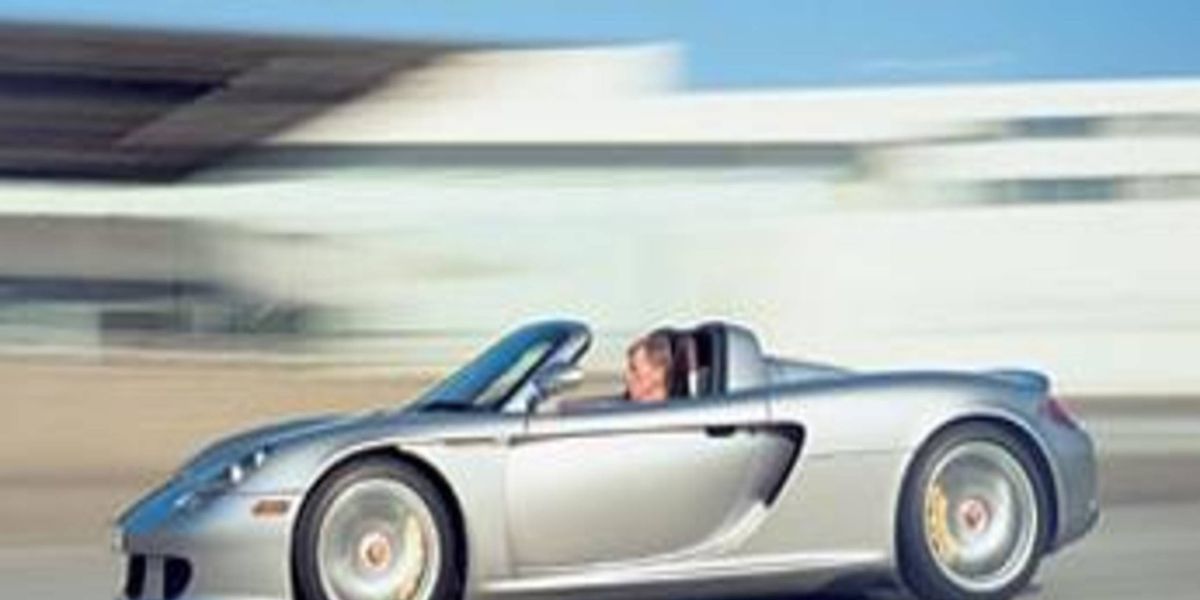 Porsche Carrera GT: The Carrera GT is like a GT1 ALMS car with nicer seats  and a nav system