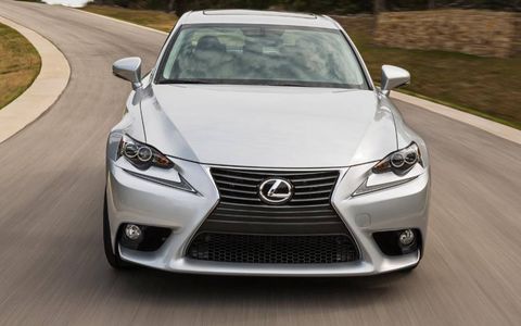 The 2014 Lexus IS sedan adopts the automaker's spindle grille design.