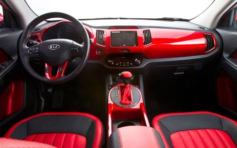 Inside is red upholstery and dash trim combined with blue LED lighting to match the exterior color scheme.