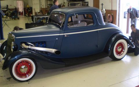 A Kustom Creations hot rod in matte blue paint.