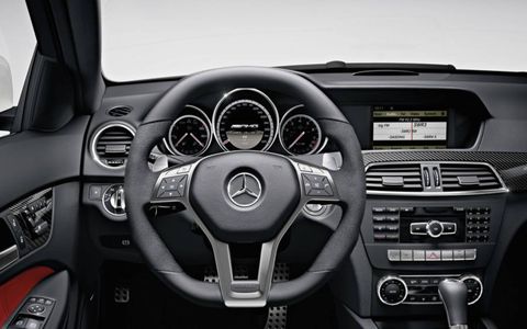Motor vehicle, Steering part, Automotive design, Product, Steering wheel, Automotive mirror, Car, White, Technology, Center console, 