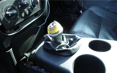 This has the look of an aftermarket shift knob from Manny, Moe, and/or Jack.