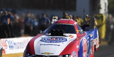 Hight powered to a track record to secure the Funny Car No. 1 qualifying position Saturday.