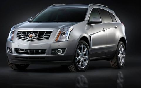 The 2013 Cadillac SRX gets a restyled grille.