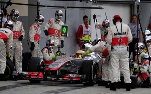 2012 Malaysian Grand Prix: Lewis Hamilton, McLaren MP4-27 Mercedes, makes a stop.