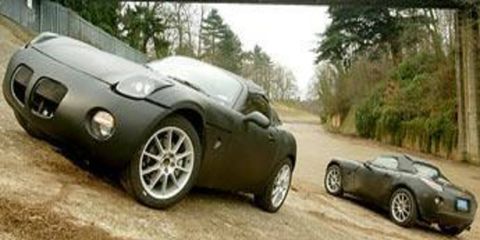 The long-deserted high banks of the Brooklands racetrack in southern England-which opened in 1907-provided the backdrop for our first drive of the Pontiac Solstice test mules.