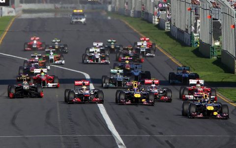 Sebastian Vettel leads the field into turn one at the start of the Australian Grand Prix. Photo by: Charles Coates/LAT Photographic