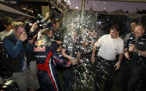 Big Splash Down Under // Formula One driver Sebastian Vettel cracks the bubbly to celebrate his victory at the Australian Grand Prix in Melbourne on March 27. Photo by Charles Coates/LAT Photographic