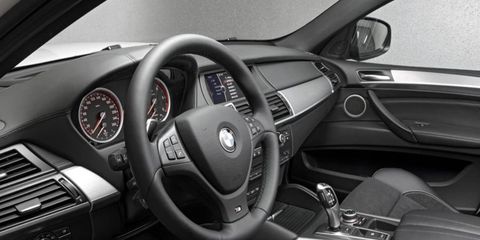 The 2013 BMW X6 xDrive35i with the added premium package features keyless entry, four-zone climate control and an in-dash navigation system.
