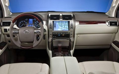 The luxurious interior of the 2013 Lexus GX 460 Limited includes a center-stack navigation system.