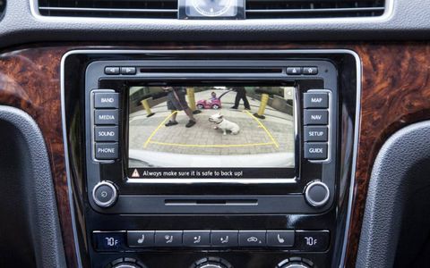 The in-dash mounted screen makes backing up a breeze with the back up camera system in the 2013 Volkswagen Passat TDI SEL.
