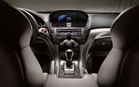 Automotive design, Steering part, Steering wheel, Center console, Car, White, Vehicle audio, Technology, Radio, Luxury vehicle, 