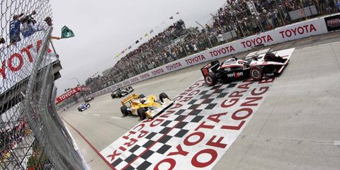 Will Power (right) and Ryan Hunter-Reay (left) lead the field at the start of the Grand Prix of Long Beach on April 17. Photo by: Michael L. Levitt LAT Photo
