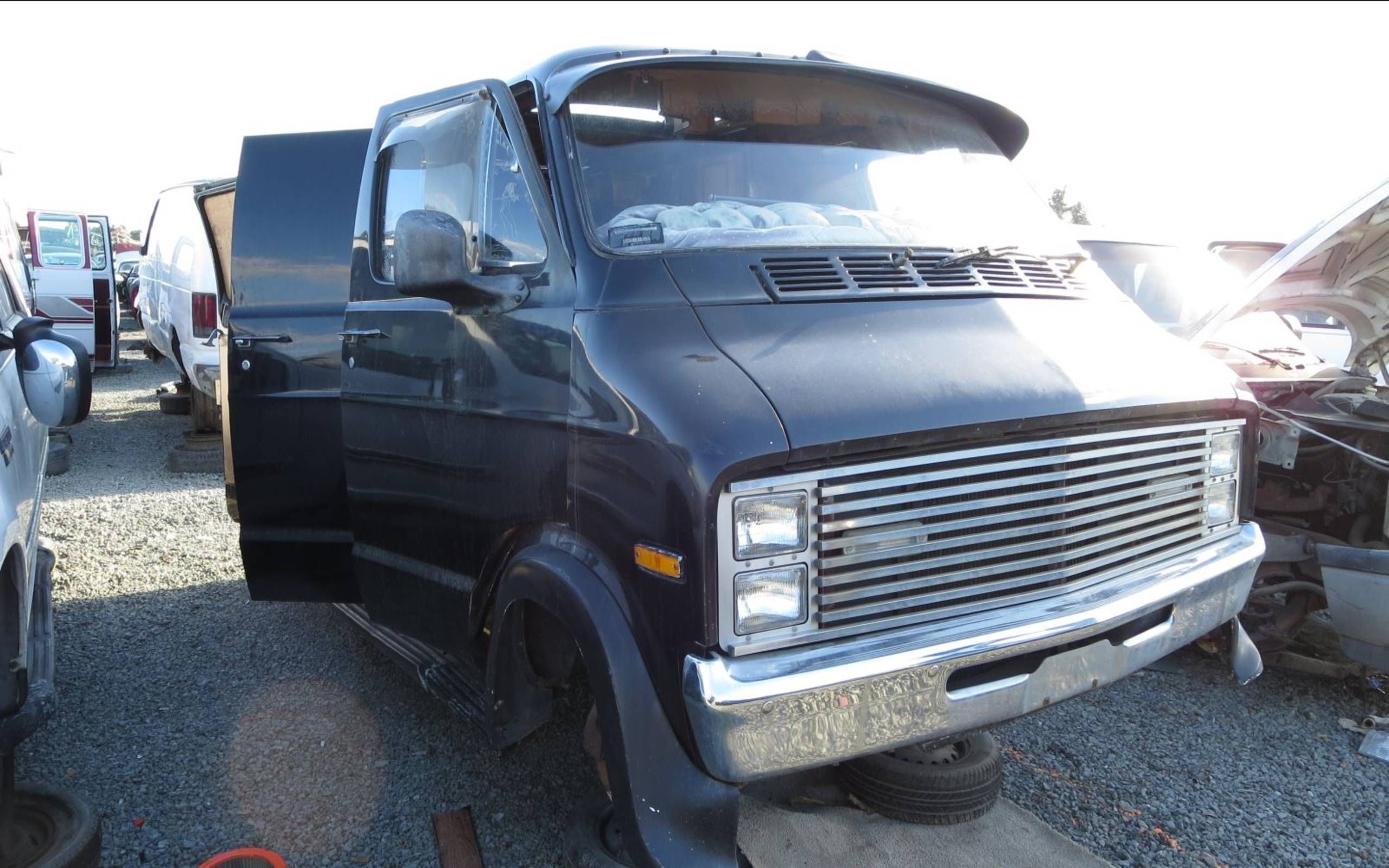 Junkyard Treasure Mid Night Cruzer 1976 Dodge Custom Van