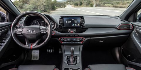 The dash clutter free for the most part and features an eight-inch touchscreen sitting on top.