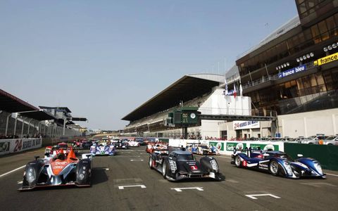 The Aston Martin AMR, Audi R18 TDI and Peugeot 908 line up on the grid at the Circuit de La Sarthe in France on April 24. Photo by: Drew Gibson/LAT Photographic