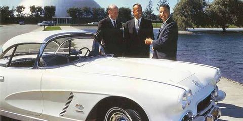 Astronaut Alan Shepard, center, stands with GM Styling President Bill Mitchell, left, and Chevrolet General Manager Ed Cole with Shepard's 1962 Corvette at GM's Technical Center in Warren, Mich.