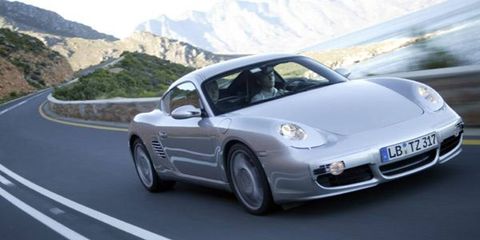 The coupe is powered by a 3.4-liter 295-hp flat-six which provides 251 lb-ft of torque between 4400 and 6000 rpm. Weighing 3152 pounds, the Cayman S boasts a power-to-weight ratio squarely centered between the Boxster and 911. Porsche claims 0 to 62 mph (100 km/h) in 5.4 seconds and a 171-mph top speed. The two-seat Cayman S slots into the Porsche line slightly above the new 2005 Boxster, and in doing so it bucks Porsche tradition of pitching coupes at a lower price point than their more complex convertible siblings.