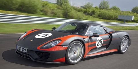 The 918 Spyder adorns a somewhat familiar and largely unadorned profile, reminiscent of the prior Carerra GT.