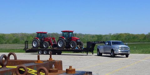 Tow anything -- even two tractors -- with a Ram 3500 Heavy Duty pickup, so long as it weighs 15 tons or less. Just make sure you have a CDL before you do it on public roads.
