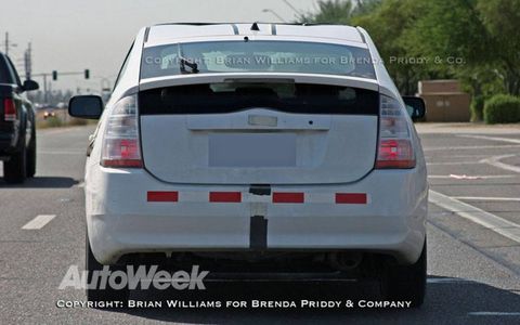 Toyota engineers are testing prototypes of the next-generation Prius hybrid. The new car is slightly larger and has optional solar panels mounted on the roof.