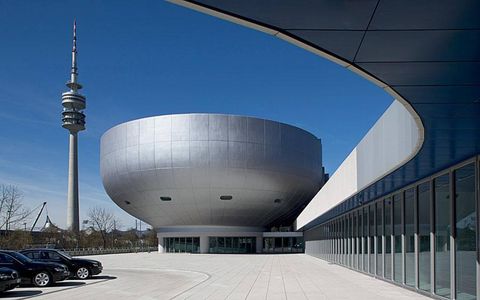 Stretching from the Bowl to the BMW HQ is a single-story building that adds almost 45,000 square feet of display area to the existing building.