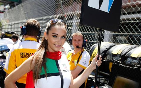 The day stars in the pits for grid girls, too.