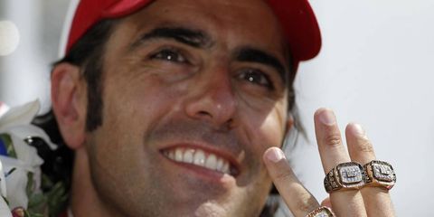 RING JOB // Three-time Indianapolis winner Dario Franchitti shows off his Indy 500 rings.