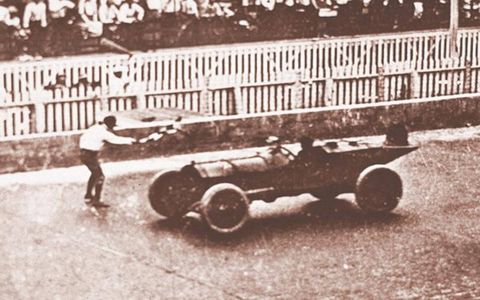 Speedway management decides to run just one major event for 1911, rather than multiple races over several days. Forty cars, mostly stripped-down passenger vehicles, line up to start the first Indy 500. Ray Harroun, in a purpose-built Marmon Wasp, wins the race in 6h 42m, averaging 74.602 mph.