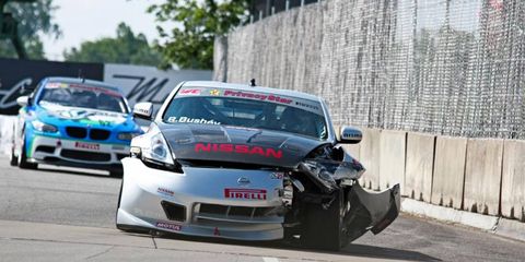 The injured Nissan Nismo 370Z of Ric Bushey makes its way around the Detroit Belle Isle circuit before qualifying on Saturday.