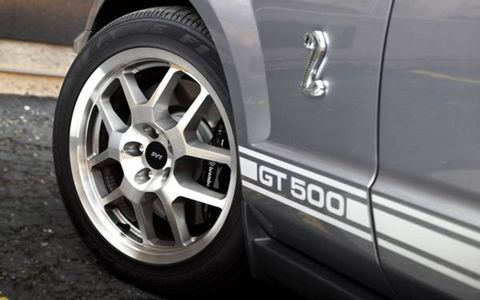 As a whole, the GT500 is a fun car to drive, with tons of torque all over the tach right up to its 6250-rpm redline. Steering is crisp and feels nicely weighted, and the brakes are superb. Short of performing a full track test of our own, we feel confident Ford&#146;s claim of just-over-100-foot stopping distances from 60 mph isn&#146;t far off the mark.Thank the GT500&#146;s larger front Brembo brakes for that rapid deceleration. Measuring 14 inches in diameter, the vented and cross-drilled discs are gripped by four-piston calipers housed within asphalt-grabbing 255/45 rubber wrapped around 18-inch rims. Rear brakes remain unchanged from other Mustangs, with 11.8-inch vented discs clamped by two-piston calipers housed within 285/40 Z-rated rubber. Braking is assisted by ABS with electronic brake force distribution and traction control.