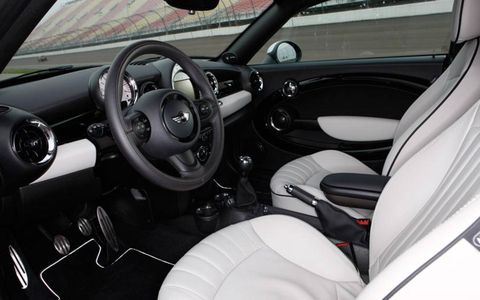 On the track, the Mini's stiffness, go-kart-like handling and additional 20 hp easily outclassed the Abarth by the tune of five seconds per lap.