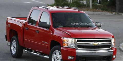 Our spies caught this camera-ready 2007 Chevrolet Silverado as it sprinted out of a car carrier and ran through a carwash in preparation for a television commercial shoot. Shown here in Crew Cab configuration with the Z71 off-road package and wearing brochure-red paint is Chevy&#146;s next-gen pickup.