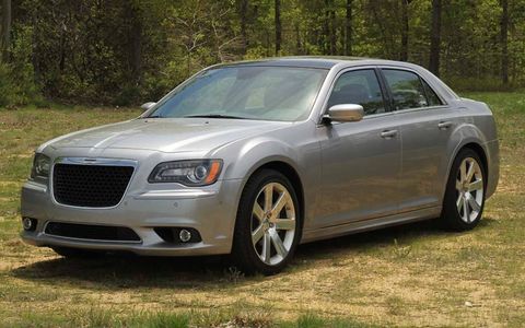 Even though the SRT is nothing like the fleet version of the 300 that we've all rented, the exterior still suffers from a bit of rental-car gloom. How about an Air Grabber hood scoop, Chrysler?