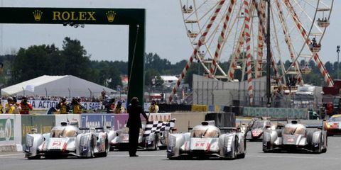 Audi crosses the line with a 1-2-3 finish at Le Mans on Sunday.