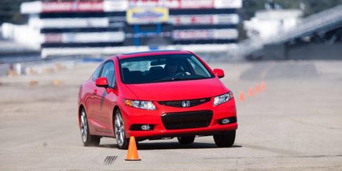Through our tight 490-foot slalom, one tester described the Si with the standard limited-slip differential and optional Michelin Pilot Sport Exalto performance tires to have &#8220;flickable dynamics,&#8221; and called it &#8220;well-balanced,&#8221; with precise steering, averaging 43.7 mph with traction control turned off.