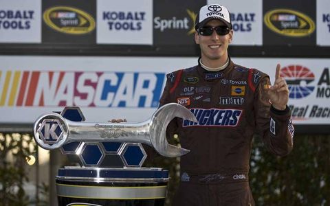 At Atlanta, Kyle Busch, in the Joe Gibbs Racing No. 18 Camry, wins Toyota's first Cup Series race.